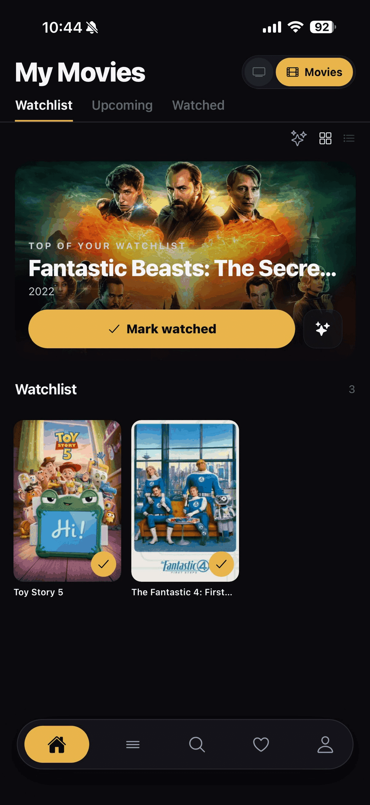 My Movies grid view with a featured watchlist movie and a mark watched button, posters below