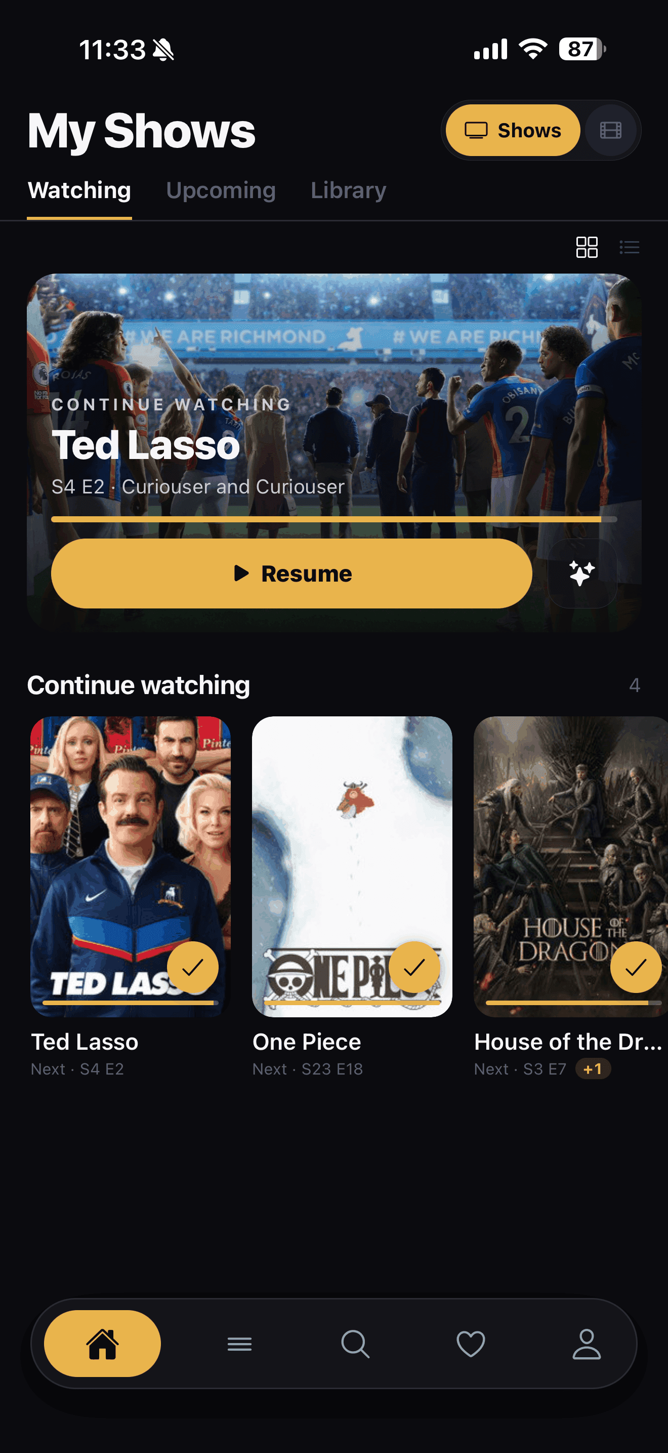 Continue Watching grid view with a featured show and poster cards